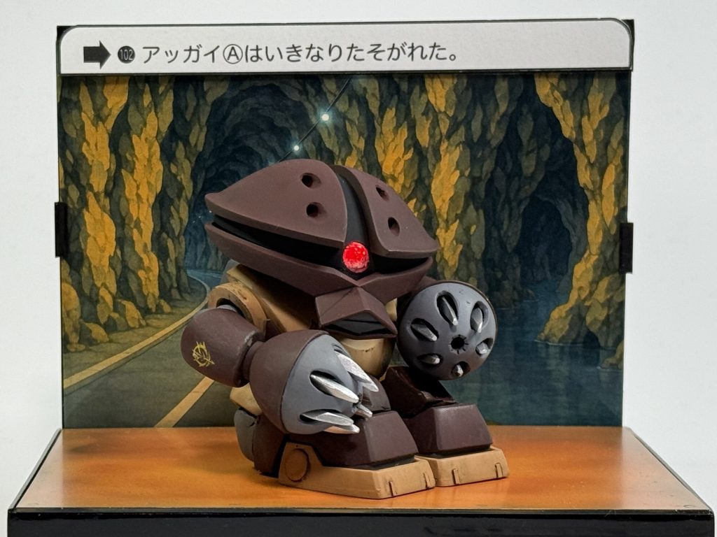 ジャブロー地下でたそがれるアッガイ。カードダスのアッガイといえば体育座り。パーツ差し替えで再現しました。