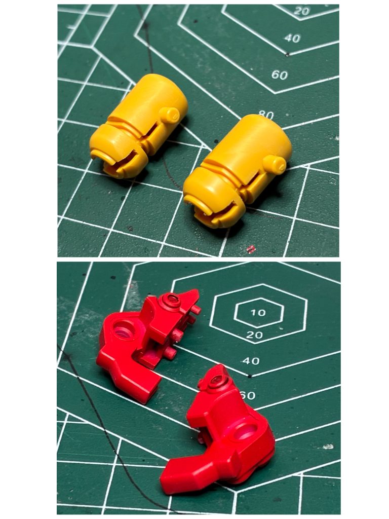 脚のタンクとかかとの合わせ目消しをしたパーツです。タンクは成形色のままでも合わせ目は目立たないですが、全体的なバランスを考えて、塗装することにしました（写真の赤い踵のパーツは塗装済みですが、タンクは未塗装。）