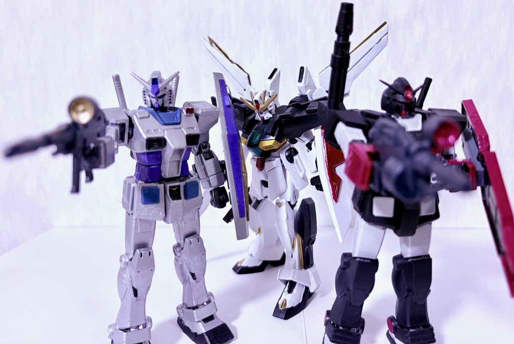 ガロードのピンチを救うタカとユージ。銃口の先にはフロスト兄弟がいるのかそれとも・・・？