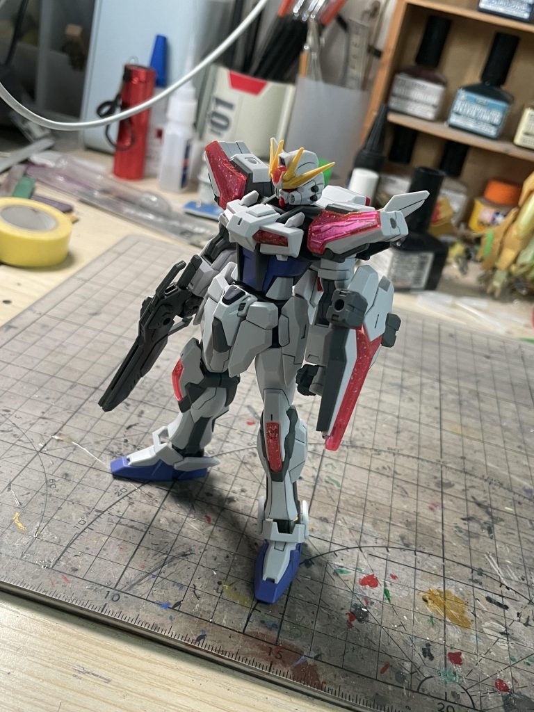 RGシステムを応用したエネルギー超光循環機構「EG(Energy Glitter-circulation)システム」が採用され、機体の各所にエネルギーを集中させ、攻撃・防御・機動時など状況に合わせたブーストアップが行えるようになり、ガンプラバトルでの総合性能値が低く設定されているEGのデメリットを微塵も感じさせない力を発揮する。