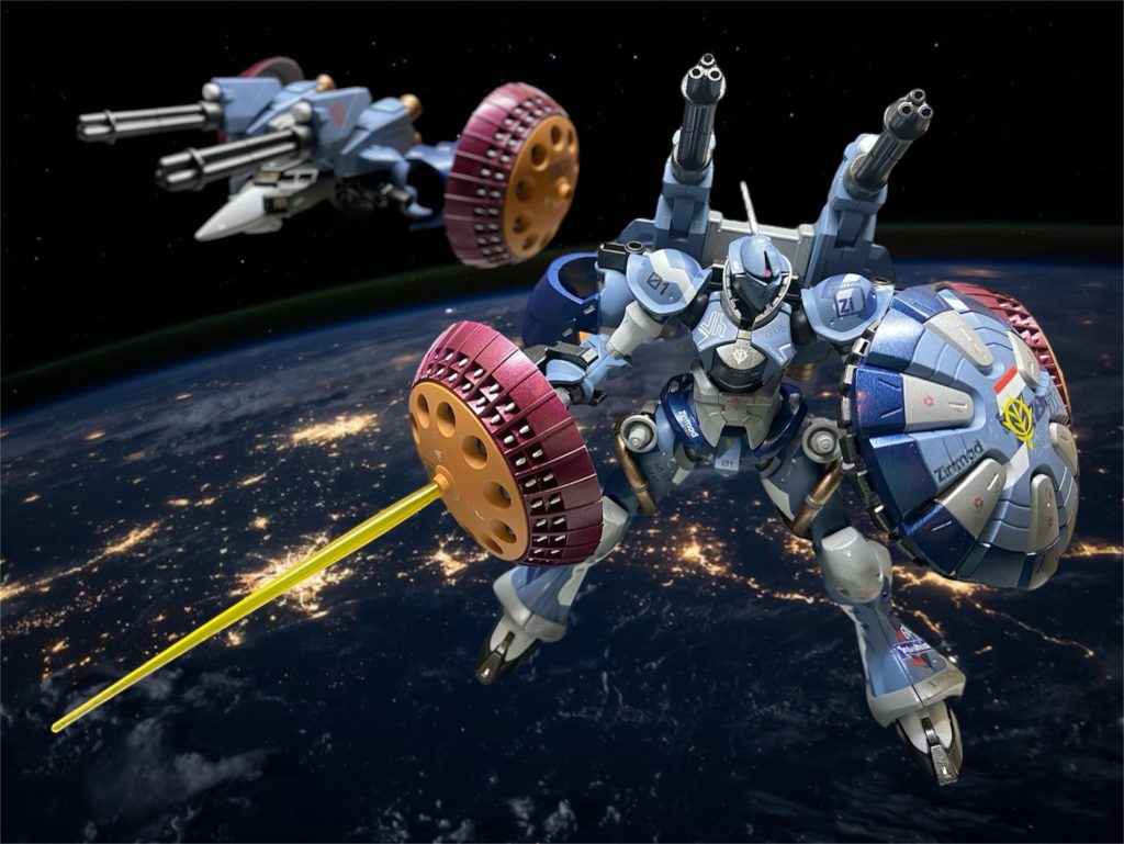 複合兵装ハクジ──MSの全高を遥かに超える全長27.3mにおよぶ長大な本体に、3門のレールガン、6基のプロペラントタンクとバーニア、超硬ガンダリウム合金製のスピアの機能を搭載したギャン専用の大型追加兵装である。機体本体の改修ではなく、携行武装にギャンの性能向上の為の能力を付与させることで、運用性・整備性・生産性に優れ、被弾時・不要時には放棄することで一点突破型の強襲機から、本来の格闘戦重視へと即座に機体特性を変えられるという利点も持つ。 対するセイジ装備は、連邦軍のV作戦で計画されていた支援機Gメカを参考に開発された重支援機Gチャリオット(ギャンチャリオット)によってギャンの機体性能向上を図るプランの呼称である。3連ガトリング砲2門、ハイドボンブ、ニードルミサイルなどを備えるGチャリオットは、通常型バックパックと換装される形でギャン背部にドッキングし、出力強化型のハイビームサーベル、ビーム発生装置も備える攻防一体のギャンシールド改などを本体に供給することで機体本来の格闘継戦能力を活かして強化する。 主機関にはどちらも、かつて“傑作”と評されたツィマッド社の土星エンジンを上回る性能の新型エンジン『ウラヌスエンジン(天王星エンジン)』が搭載され、推力を大幅に向上させた。