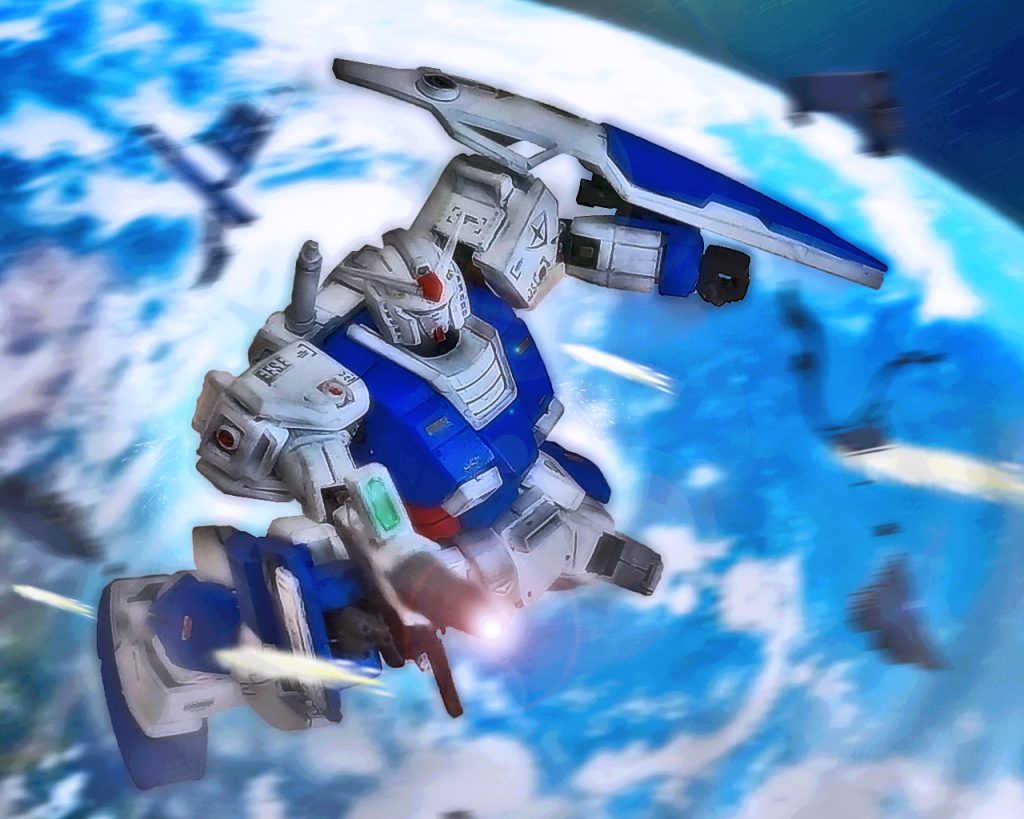 「何だっ、なんて推進力だ!?、それにあの動きはっ…!?」モア・グレイシーはマシンガンでガンダムを狙うが、先刻とは違う機動性に驚愕する。そもそもガンダムは大気圏に叩き落とし、大気との摩擦で燃え尽きる筈であった。しかしガンダムは突如、目を醒ましたかのように推進剤を吹かすと、重力の鎖を引き千切り不死鳥の如く息を吹き返した。そしてモアに向けてビームライフルを撃つ。(…今までのは手加減でもしていたのかっ!?)モアはフルオートで撃つが弾は当たるどころか掠りもしなかった。(…避けているんじゃない、…あれはこちらの動きを読んでいる！)あのガンダムは目の前で起きている事象に対し対応しているのではない。動きを先読みし動いていると判断したモアは顔つきが変わる。「マサムネっ、隊を引き連れ先に行けっ！」「どうしたっ、何があった!?」「説明している暇はないっ！俺が時間を稼ぐ、早く行けっ！」モアは珍しく感情を表に出し声を張り上げた。副隊長のマサムネ・キリュウは普段聞かないその声に只事ではないと咄嗟に判断する。「了解した、全機私に続け！戦闘区域から離脱するぞ！」モアは手短にキリュウへ伝えるとガンダムとの戦闘を続けた。2機は先程とは違うドッグファイトで互いに一歩も引かず攻防一体を繰り広げる。するとそれを目視したトライバル隊の機体が援護に入ろうと接近する。「…下がれっ!!貴様達の手には負えんっ!!」モアがそう叫んだ時には既に遅かった。