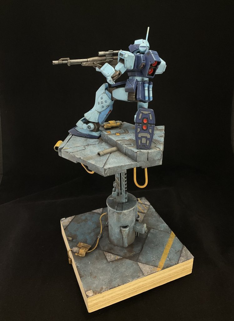 it's a little awkward to pose this model kneeling, so a portion of the platform is raised 