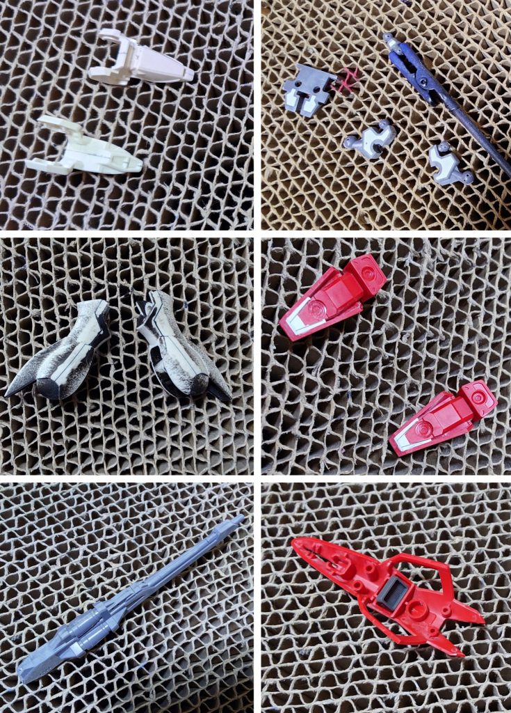 加工中の様子。肉抜き穴埋めは首関節裏、足首関節、足の爪先裏、バックパック裏側に実施。膝関節横の肉抜き穴は埋め忘れたので、こういうデザインだということにしておきます。合わせ目消しは肩アーマー、脹脛、バスターライフルに実施。