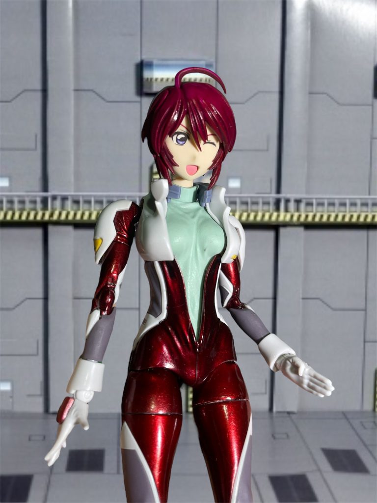 成形色の赤は気に入らないため、ラバー系スーツのような質感に変更したいです。光沢仕上げに加え、メタリック粒子を表現してください。グレー部分はスエード調を想定しているので、艶消し仕上げでお願いします。ホワイトのパーツは耐衝撃プラスチックを想定しているので、研ぎ出しによる光沢仕上げのみでお願いします。