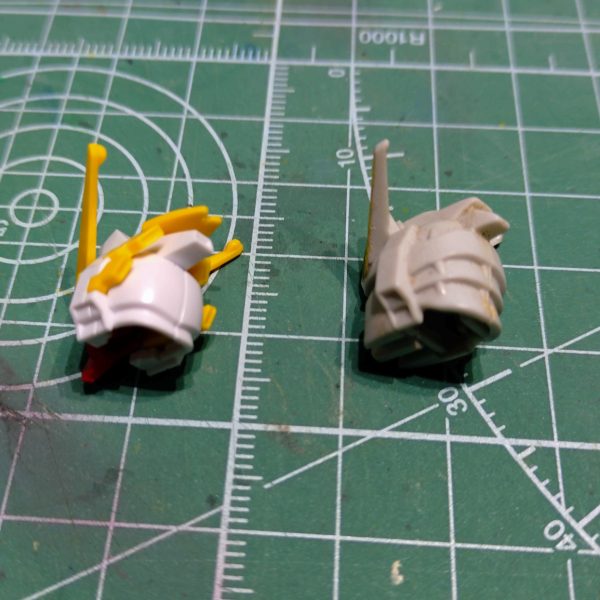 機動武道伝Gガンダムよりヒロイン搭乗のライジングガンダムです。HGFC シャイニングガンダムが買えたので手元の当時品とのミキシングをやります。①保管用に購入した旧キットよく見ると足組み間違ってますね(汗)②素体のシャイニングと比較大きな改造は頭部と肩、足と武装類ですね③④⑤当時品の頭部と比較してミキシング検討後頭部は結構違ってますね・・・使えそうなところの切り貼りしていきます。⑥足の形状スーパーモード時に展開する箇所のデザインが違ってます。ここは移植しようと思います。今月の某模型紙にもライジングガンダムの作例がありました。GUNSTAの先人達の作品も参考にしつつ、壊してしまった当時品を使ったリメイクを楽しみたいと思います。(4枚目)