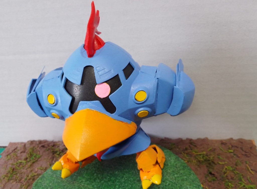 横向きに可動する脚と羽根を左右で入れ替えてちょっと上向きに羽根を向けられます。かわいいね(gundam-kao3)