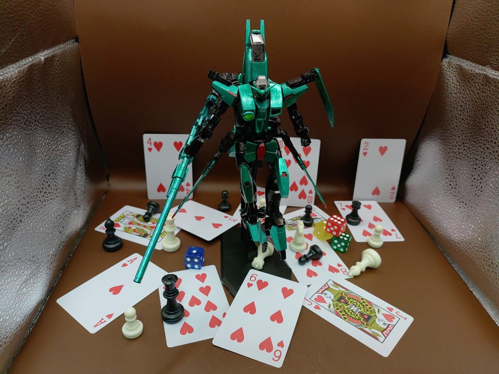 ー貫通の奇術師ー　ガンダムデュナメス◯説明ソレスタルビーイングの実行部隊が保有するガンダムの一機。ただの汎用機を4機作成するのではなく、各分野におけるスペシャリストな機体を作成する事によって、様々な状況に対応する考えの元作成された。ガンダムデュナメスは、隠密、索敵、狙撃に特化する機体とし、様々なミッションを裏側から支える。その高い狙撃能力は地上から大気圏外の目標を狙撃出来る程で、意識外から狙撃される事から「貫通の奇術師」と呼ばれる。狙撃が得意とはいえ、おまけに近いMS形態であっても、得意な射撃能力と高い索敵能力から、敵に囲まれても対応可能な汎用力はまさに一騎当千の天使と呼べるだろう。