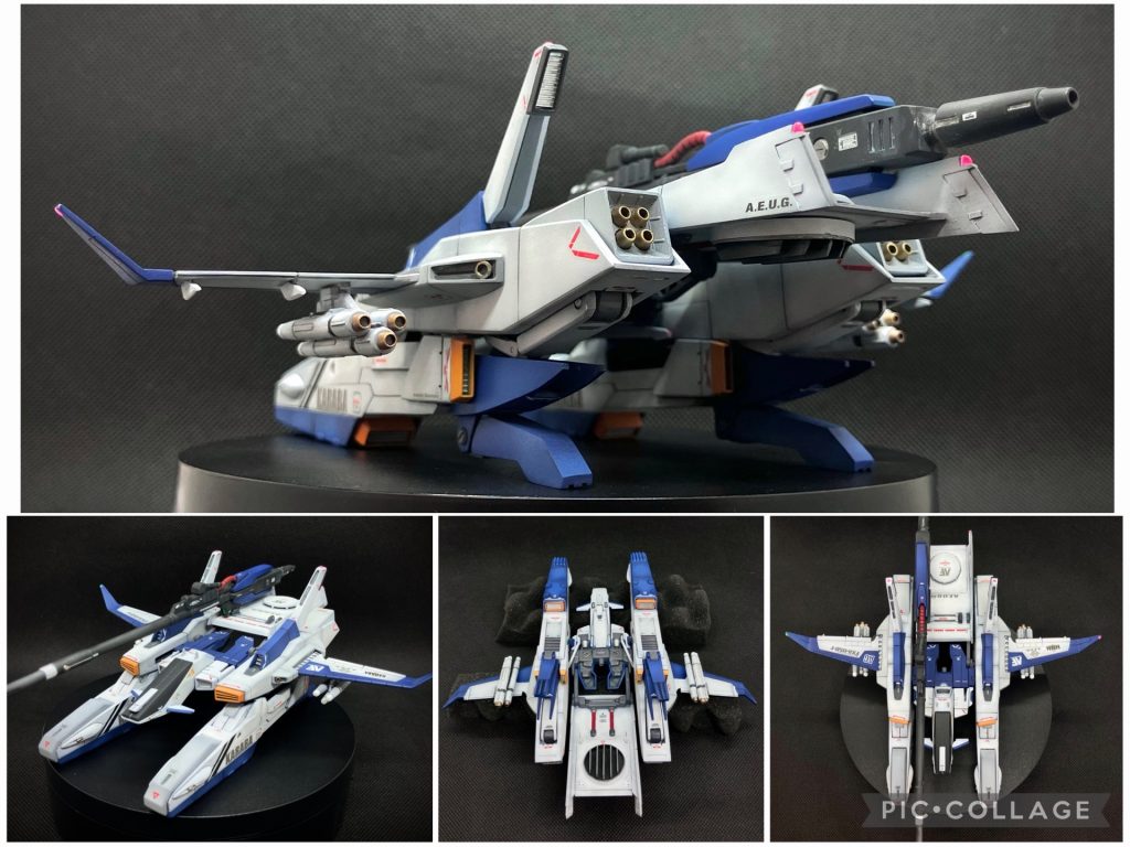 ドッキング前のGディフェンサーです。航空機のイメージを強めたかったので、主翼はジェット機を参考に、エルロン、フラップ、スポイラーなどを、後端部にはラダーをイメージさしたディテールを追加。各部にポジションランプも追加しました。 ポンツーンの裏や後部装甲板の裏には、垂直離着陸装置として機能する核熱ジェットエンジンをプラ板で制作し追加しました。 本来、右側面にマウントされるロングビームライフルですが、あまりにも航空機としてバランスが悪いので、後部装甲板に追加したウェポンラックで上面にマウントするように変更しました。