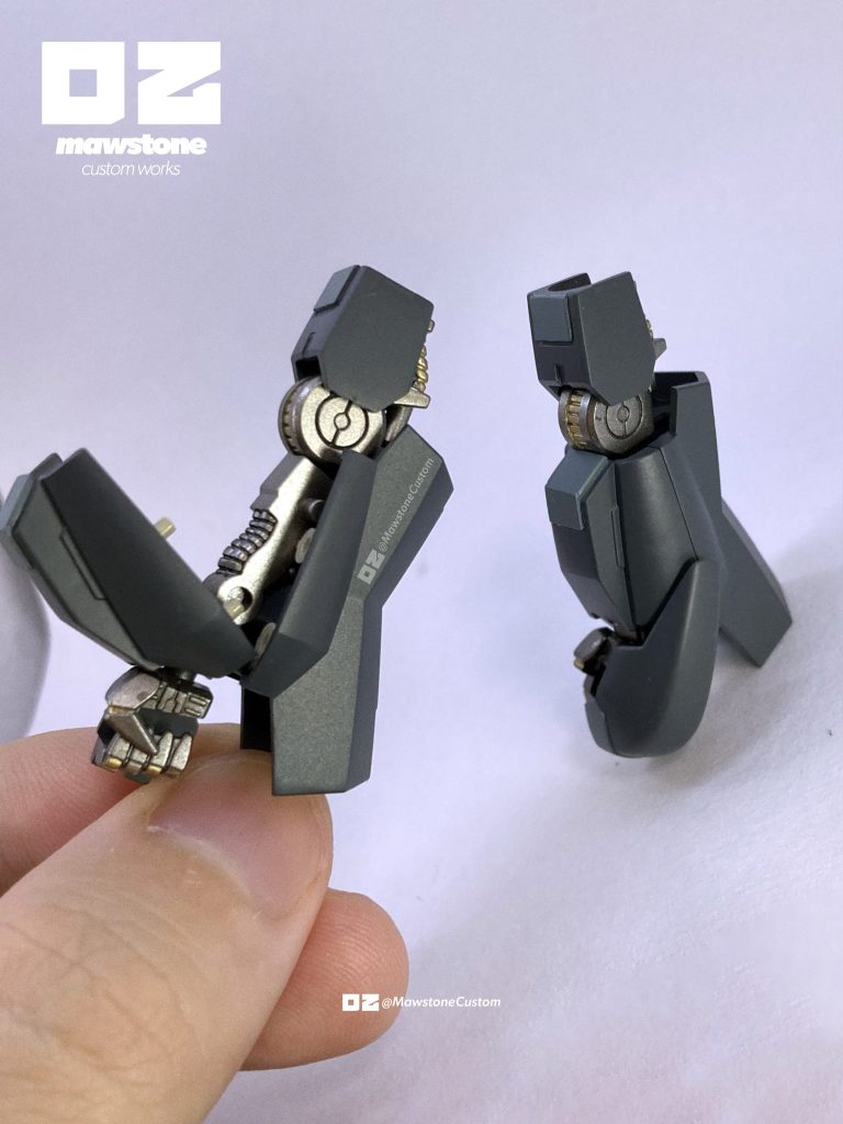 腕はガンダムフレームをしっかり維持しています。グレイズのパーツを流用しており、肩は形を変えて使い、二の腕には手首、前腕には脛、ナックルガードには頭をそれぞれ使用しています。