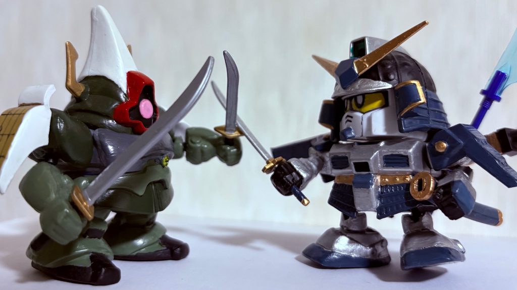 武者怒武と一騎打ち。思えばBB戦士のキットでボールジョイント改造をしていたおかげで旧キットでもやれるようになったワケか・・・。