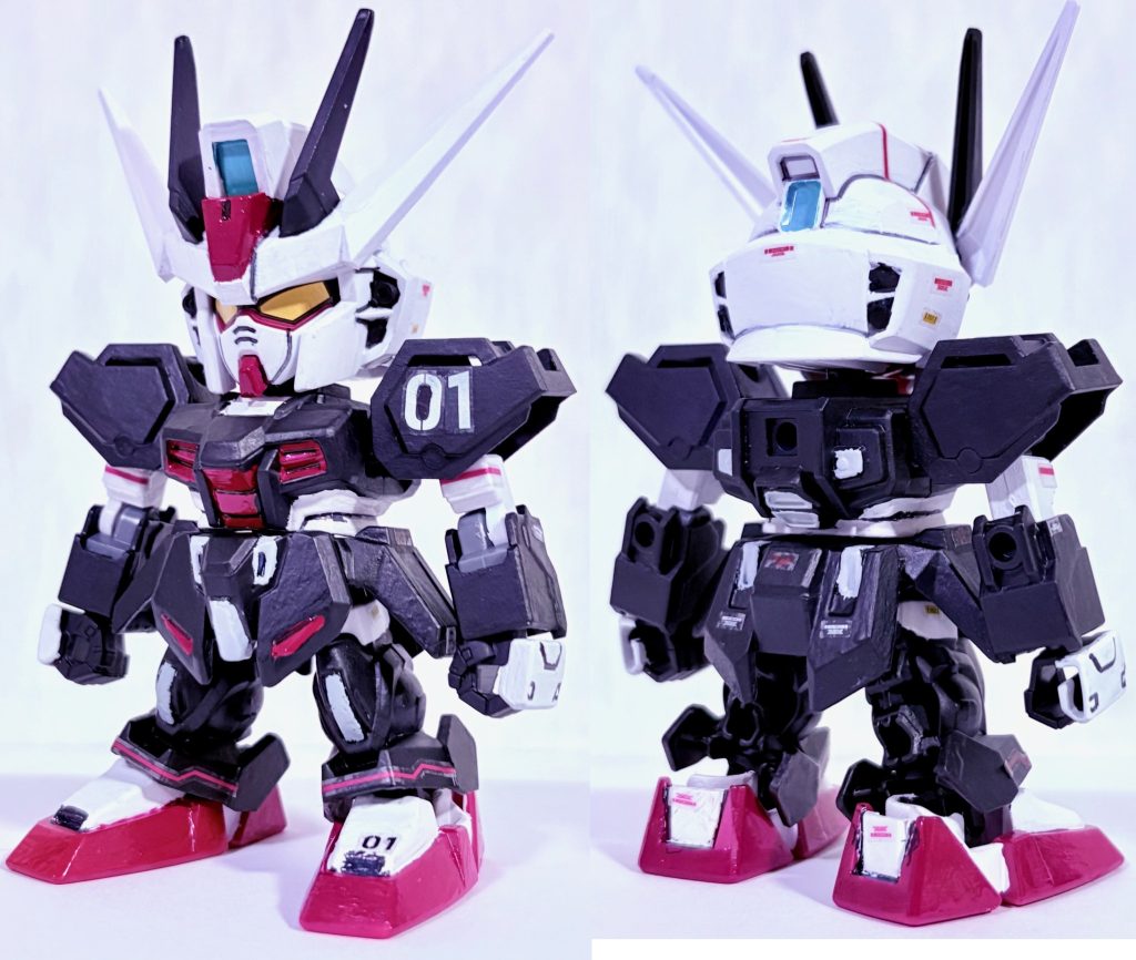 フロントビューとリアビュー。練習がてら機体の各部分にデカールを貼ってリアルな感じに仕上げている。デカールはジムナイトシーカーと30MMシリーズから流用。「01」と数字が貼られているがこれはSEED世界における「01ガンダム」を意識したものである。腕の肉抜き穴はパテ盛りした。