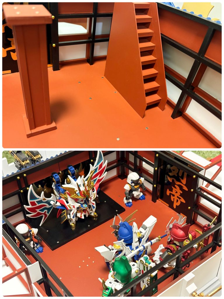 次に2階部分です。烈帝城のメインとなる空間をイメージして作成しました。広い空間なので、長期ディスプレイの際は格子状に組まれた柱パーツを設置しますが、磁石接続なので、遊ぶ際は外すことができます。3方の壁面にはそれぞれ「烈帝」、「天地」という文字と結晶鳳凰(クリスタルフェニックス)が描かれており、金色のシール紙にプリンタで印刷することで表現しました。結晶鳳凰の絵は、当然ちょうど良い大きさのものもないので、ボールペンで紙に描いたものをスキャナで取り込んで作っています。この階は、階段がちゃんとあるのも地味に注目してほしいポイントです。