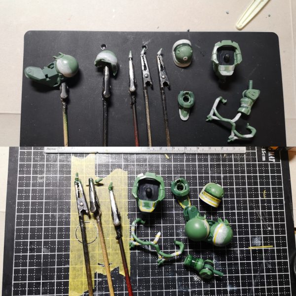 以前、GQザクの塗分けライン同塗分ける？という投稿に付属のシールでマスキングすれば？などと発言したので、責任をもって検証ししました。結果、普通にマスキングテープを細切りにした方がラクだな。との結論に至りました。途中、シールをトレースしてマステを切ったら？とも思ったのですが、曲面がきれいにカットできませんでした。成形色は緑が3種類。シールにあるのはおそらく中間の色。塗分けはラインが入りそうな所に白or黄色を塗っておく、肩のグリーンも。細切り（今回は１ｍｍ）のマステを貼っていく。曲線は自分の直感を信じて・・・スパイクアーマーは１か所一体成型になっているので、一旦切り離す。裏に肉抜きがあるので、そこをガイドに１㎜プラ棒で軸を作る。微妙に角度がついているので最終接着時に注意。マスキングが円形になりますが、黄色いラインの小径ｒが約8ｍｍ、ダイソーのサークルカッターで切れました（メモリが当てにならないので、手持ちのスケールで合わせた方が良い）。ラインの太さのお好みで大径を決めればよいかと思います。肩と腕の黄色いラインは一段下がっているので、最後あとから塗って、はみ出した部分をふき取るか、２段階にマスキングすればどうにかなりそうです。あとはマーキング類ですが、背中の２か所文字らしきものは、なんて書いてあるか解らないので、それっぽいヤツを貼ればヨシっ！！ジオンマークは若干サイズが違いますがガンダムデカールのジオンMS用③が赤白黄灰色の４色で大中小とあるのでそのへんかな？問題は盾の正面にある撃墜マーク？？っぽいのとジオンマークの下の「MAY VICTORY BE WITH US」の文字ですね最後に参考程度に手持ちのガンダムカラーのグリーン系（ラッカーと水性が混じっておりますが）左からラッカーのMSグリーン、MSディープグリーン、水性のﾌﾞﾗｽﾄｲﾝﾊﾟﾙｽｸﾞﾘｰﾝ、←たすブラックです。ん～どうでしょう、長くなりましたが参考になりますかね？（4枚目）