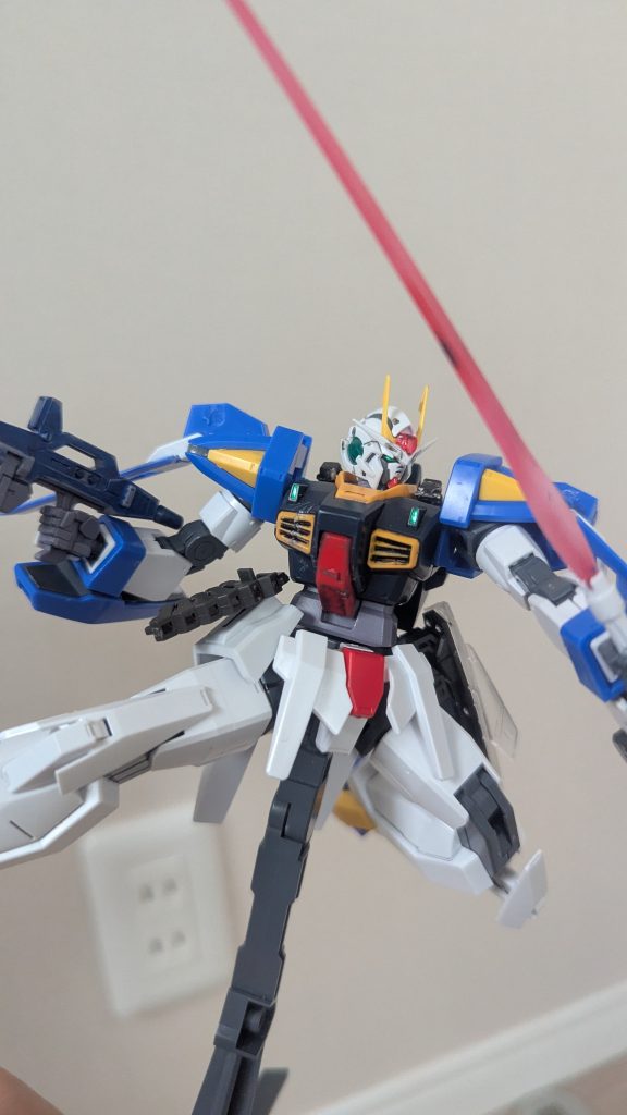 左腕が戦闘中に折れた為、GNソード等の実体験は廃止され、中距離戦重視の標準的な武装に変更された。又、頭部は修復不可なまでに破壊された為、埃を被っていたダブルオーガンダムの頭部のパーツを用いて復元している（黒いとこがあるのはそのせい…という設定）コンセプトが「当たらなければどうと言うことはない！」なので高機動戦闘が主。そのためGN粒子で軽量化を更に突き詰める為、武装の総重量を落とした。（主にソード系）結果としてOガンダムの武装に近くなったのは整備する側としても嬉しいな。byバスティ親子