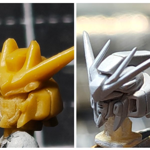 ガンダムアーティファクト第1弾のhi-νガンダムの頭部改修完成【頭部2】①アンテナブレードの小さいほうもプラ板で切り出し、持ち手のプラ板に接着してヤスリで整える②頭部のバルカンディテールを追加。エポパテを棒状にしたものを接着。③頭部は3パーツ構成にしました。今までの改修はフェイス部分を別パーツ化して、2パーツ構成でした。しかし、最後にフェイス部分をスライドしてはめ込む時にうまく入らない、ラピーテープの目が取れたりと苦戦するのでアーティファクトのガンダム系のひさし＆角で、上記の問題を解決することにしました。口も別パーツ化することでシャープ化、塗り分けがきちんとできる利点を得れると思います。問題点は、小さすぎてピンセットではじいて紛失しまくりです(-_-;)④原型と比較　1弾のガンダム系はしょうがないよね。最新弾のνガンダムは改修の必要ない出来。バンダイの技術はすげーや(>_<)あとは、塗装してスミイレがきれいに出来ること願うまでです(>_<)（5枚目）