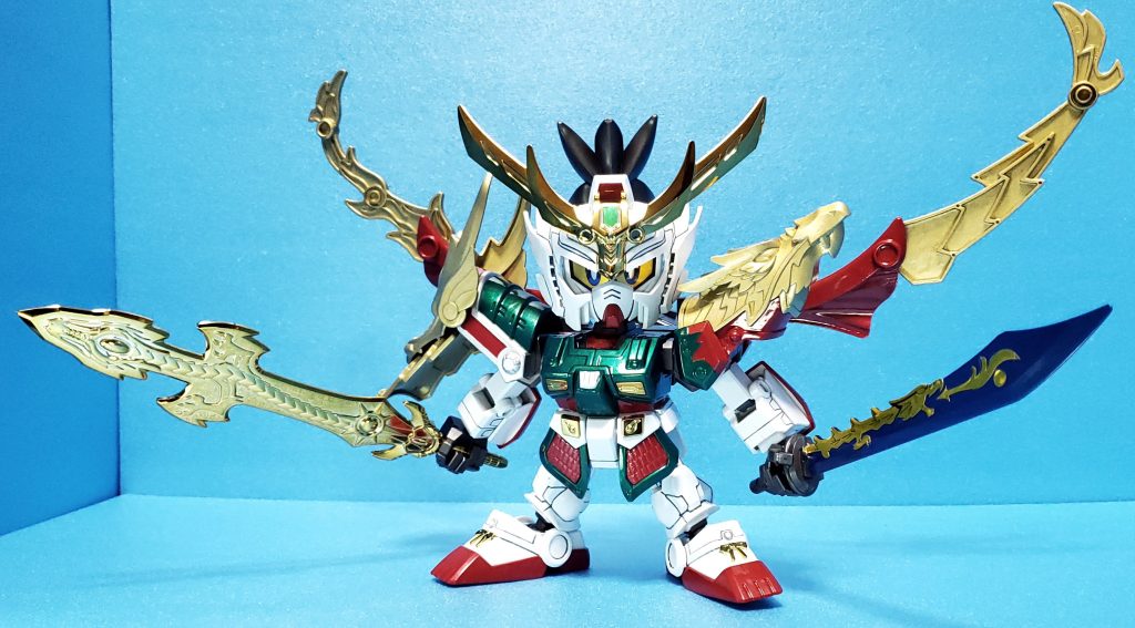 三位一体真 雷装 張飛ガンダムと真 鬼牙装 関羽ガンダムの肩鎧が装着され必殺技の星龍斬がパワーアップ。