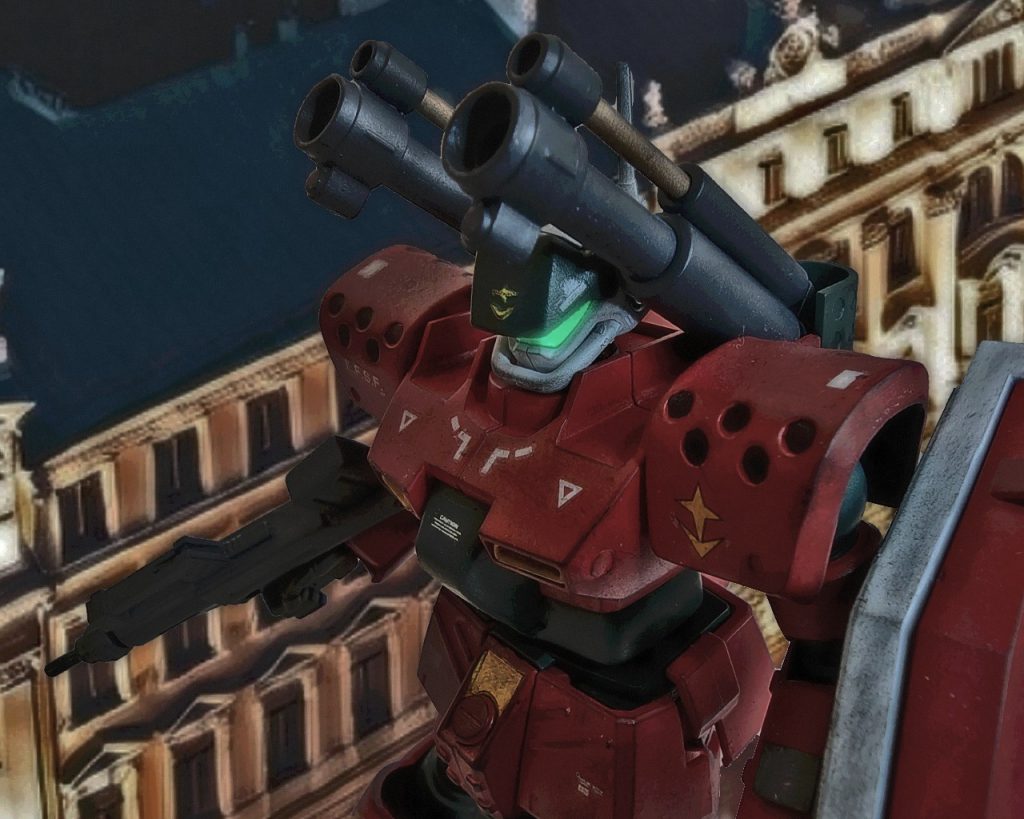 「た、隊…、隊長……」目の前で起きた事に量産型ガンキャノンのパイロットは一変し冷や汗と震えが止まらなかった。(な、なんでだよ…、ここは中立コロニーで戦闘なんか起きない筈だろ？…どうして人が死ぬんだよ、…おかしいだろ!?)彼はこの状況に理解が追いつかない。この中立サイドには赴任してきたばかりで先の戦闘も、人伝の話しでしか知らなかった。戦争はもうすぐ終わる。地球連邦軍はジオンの最終防衛ラインまで侵攻していて決戦も近い筈だ。なのにどうして、…どうして？奴らがこの戦争に勝つ見込みなんて微塵もないのに。