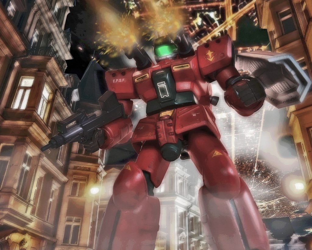 「……ぅウアアぁぁっっ!!!!」絶叫とともに指先はキャノンのトリガーを引いていた。彼はこの日、初めて命令違反をした。眼前で上官がやられ自分の死が頭をよぎったのだ。量産型ガンキャノンは轟音を響かせ白煙を撒くと砲弾は一直線に翔んだ。それでも動揺していたとはいえ、砲弾が逸れて後方の建物へ被害が出ないよう手前の道路へ照準を調整していた。着弾すると敵機と倒れたジムは煙で視界から見えなくなる。煙が薄まったのはそれから数秒だっただろうか。彼にはそれが物凄くスローに感じた。