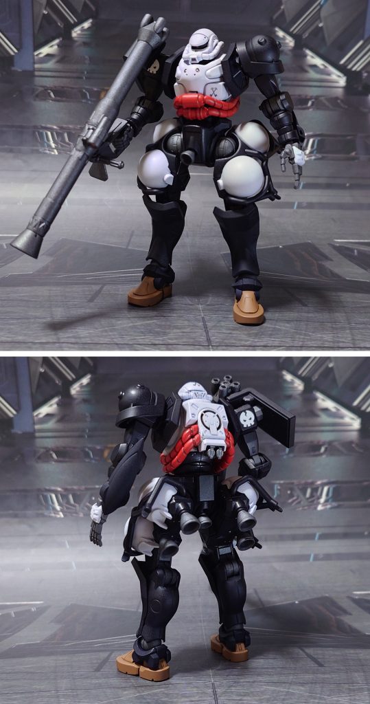 ザク(GQ)“ハンプティ・ダンプティ”の前後ろ。工作は、ゲート痕処理、パーティングライン・段ズレ・ヒケの対処、面出し、合わせ目消し、肉抜き穴埋め、穴開け、市販ディティールアップパーツの貼り付け・埋め込み、可動軸への真鍮線打ち込みを実施。左肩アーマーのスパイクは切り落とし、穴を塞いでアレンジ。仕上げにガンプラとは無関係の、コミカルな髑髏マークのデカールを“ハンプティ・ダンプティ”に見立てて貼り付け、パーソナルマークとしました。