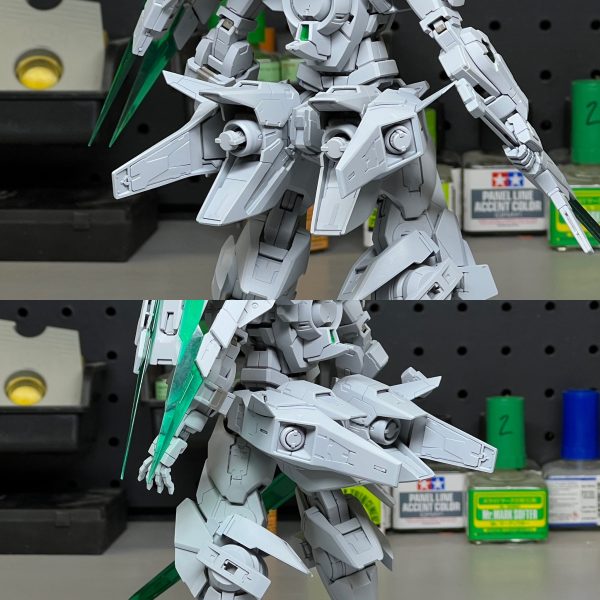 MGアストレア タイプFの改修作業進行中。主な改修内容は以下の通り。&nbsp;MGデュナメスおよびキュリオスに付属するGNブースターの追加。MGクァントに付属するGNソード4の改修。エクシアシールドをクァントと同様に肩部に装着できるように改修。胸部および膝部装甲にデュナメスに付属するミサイルポッドの追加。（5枚目）