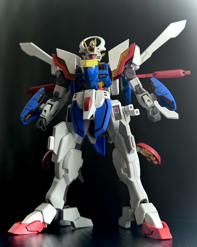 SHINING GUND-ARM　アスティカシア高等専門学園に転入して来た転校生、克州土門（かしゅうどもん）が持ち込んだ機体。シャイニングガンダムという名前は土門が付けたものであり、本来の名前は不明である。当然、スペックなども不明な部分が多く、ただ一つ確実に判るのは、この機体に軍の最新技術であるパーメットトレースシステムが搭載されていること。これだけである。しかし、この謎の多い機体も少しずつ隠された機能が明かされていくのだろう。型式番号を始め、細かなスペックなど一切不明であるが、修理などの際、使用されるパーツのほとんどがジェターク社のものである事から、なんらかの関係があると思われる。鮮烈なデビュー戦となった不良グループとの闘いでは、この機体の隠された姿であるスーパーモードを発動。シェルユニットで構成された腕、拳から放たれる、流派東方無敗の奥義の一つ、気炮暗黒通（きほうあんこくつう）を放っている。土門は、この機体でアスティカシアの決闘を闘って、闘って、闘い抜き、仲間を友を、そして愛する人を得ていくのだ。　学園の決闘の中で拳をぶつけ合う土門は、多くの仲間、友を得る。…華美な装飾の施されたミカエリスを操る貴族の少年。…機体各部に龍を想わせる意匠のザウォートを駆り、土門をアニキと慕う少年。…アメフトのヘルメットの様なデザインにローラスケート型脚部、バット状の武器を振り回すデミバーディングの、常に周りに女生徒を侍らせている少年。…そして不良グループのリーダー。ちなみにサブリーダーはクール眼鏡美人だったりする…。彼らは、後にシャッフル同盟という名で呼ばれる事となるのだ。…彼の機体、シャイニングガンダムのメカニックを担当する女生徒、美花村玲院（みかむられいん）とは、運命的な出会いをし。…そのなんというか、ラブラブな…、いや、別にここで言う事ではないだろう。　こうして始まったこの物語は、アスティカシア学園でGUND-ARM &nbsp;Fighter（ガンダムファイター）として、人として、大きく成長していく克州土門、魂の物語なのだ。&nbsp;↓ ↓ ↓ 以降、ダイジェスト↓ ↓ ↓&nbsp;