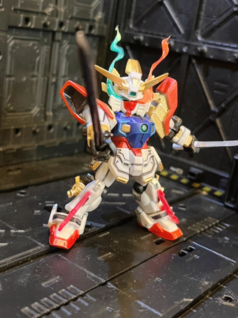 武装右手→光輝刀（太刀）左手→光輝刀•短（脇差）足→輝刃脚薙刀→輝光薙輝刃剣（ビームソード）暗刃剣（ビームソード）マント