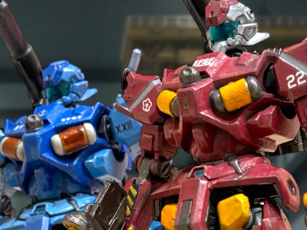 「ジオンでは、お前らみたいな戦い方をM.A.V.とか言うらしいじゃないか。」　基地のドックに戻って、機体から降りる。無重力のドックをふわふわと漂いながら、イギーは若い部下たちに話題を振った。「M.A.V.……？」　ジンは首を傾げたが、ミヤギはイギーの言葉を受けた。「２機１組の連携戦術ですね。」「お、さすがミヤギくん。勤勉ですナ。」イギーは、わざと硬い言い回しで、茶化すように言う。「互いに背中を預け合うのがM.A.V.戦術ですが……申し訳ないですが、曹長が勝手についてくるだけで、別に信頼や連携を意図した共同撃墜と認識したことはありません。曹長の機体が自分の直掩を行い、その過程でそれぞれが格個撃破を行っている。それだけです。」「……俺は、何か君に恨まれるようなことをしたかな？」妙に冷たいよな、と、ジンは柔らかい口調で抗議する。