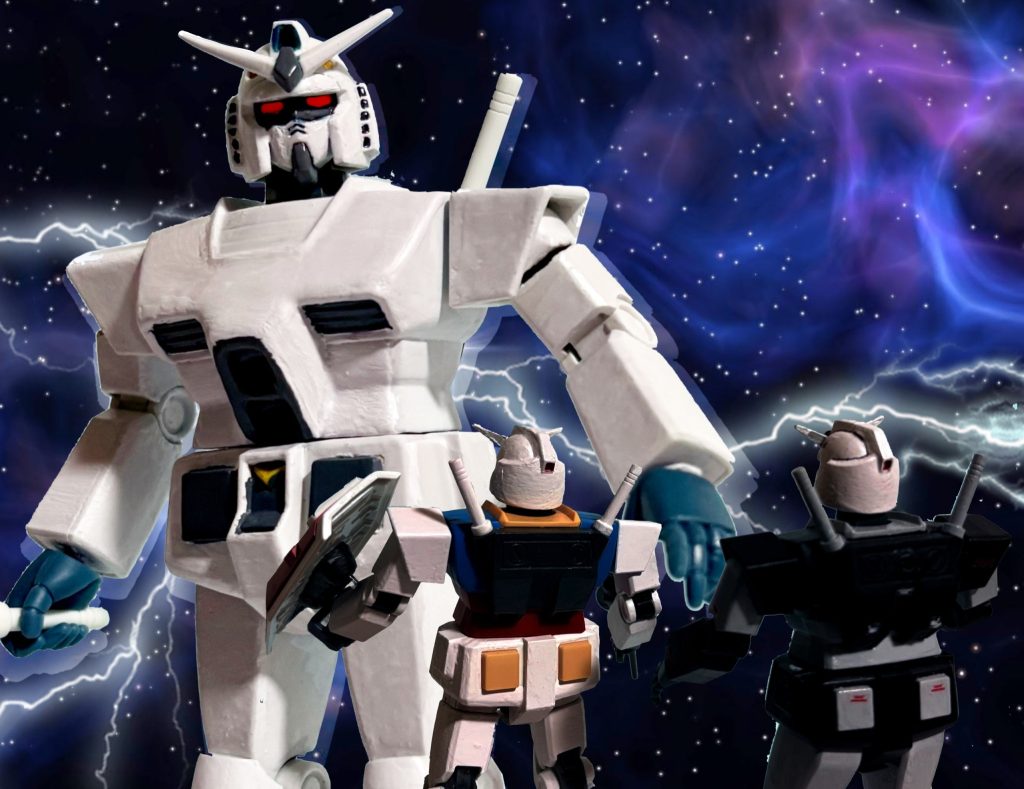 最終回のあのシーンが俺設定の「あぶないガンダム」だとこんな感じになる。いつの間にかゼクノヴァを通って現れた近藤課長。とっくに定年退職したかと思いきやハイパーガンダムに乗って突如二人の前に出現した！！タカ「化けダヌキのお出ましだ」近藤課長（ハイパー化ガンダム）「鷹山、大下ァ！！お前達はガンダムの世界でも人様に迷惑をかけおって、この大馬鹿者！！」タカ（プロトタイプ）「仕方がなかったんですよ課長、俺達がガンダムに乗って戦わなきゃギレンが好き勝手やってたんですからぁ」ユージ（ノーマル）「課長だってウ〇ト〇マンみたいに巨大化してるじゃないスか！！」近藤課長「ええい、言い訳は聞かん！今度ばかりは始末書だけでは済まさんぞ！！」ユージ「タカ、どうすんだよコレ⁉」タカ「逃げるに決まってんだろ！！」マチュ「やれやれ何やってんだか、私もう知ーらない（呆）」&nbsp;※なおジフレドが手に入り次第、そちらでも再現予定。&nbsp;