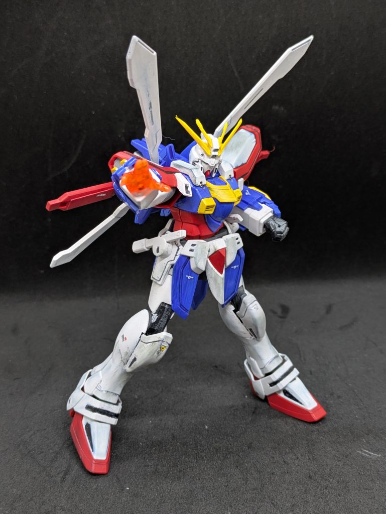 GF13−017NJ II ゴッドガンダム。主人公ドモン・カッシュの搭乗機体です。前半の主役機シャイニングガンダムから乗り換える後半の主役機になります。キットはマスターガンダムより前に発売されています。HGとしては可動すると思いますが、最近の販売は見ないですが、RGの方がモデラーの評価は高いです。とはいえよく出来ていると私は思います。バインダーに肉抜き穴があるので、ここは目立つので埋めました。見えなければ埋めません（埋めろよw）。