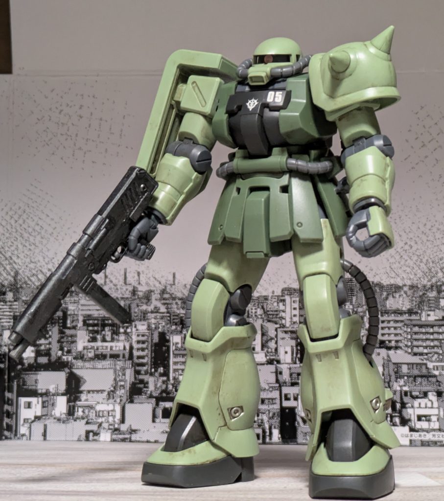 元々ベースとなったF型は宇宙、地上問わず運用可能な万能機であったが、地上運用の際には厳しい地球環境に対応するための処置やデッドウェイトになる宇宙装備が現場の整備担当を悩ませていたためジオン軍では地上用に空間戦闘装備をオミットしたJ型を配備したが、上層部では調整無しで宇宙・地上共に運用可能なザクの改修型開発をジオニック社に依頼。ジオニック社ではジオン軍の要求に加えて機体生存性の強化や操縦系の改良を加えた。その結果完成した機体は元々の要求に強化された装甲とS型並みの機動性を持ちながら新人でもスペックを発揮できるほどの素直な操縦を実現。このザクⅡF2型の仕上がりに満足したジオン軍は一年戦争中盤に量産試験機を第603技術試験隊のヨーツンヘイムへ配備しルナツー宙域外縁にて運用試験を開始した。