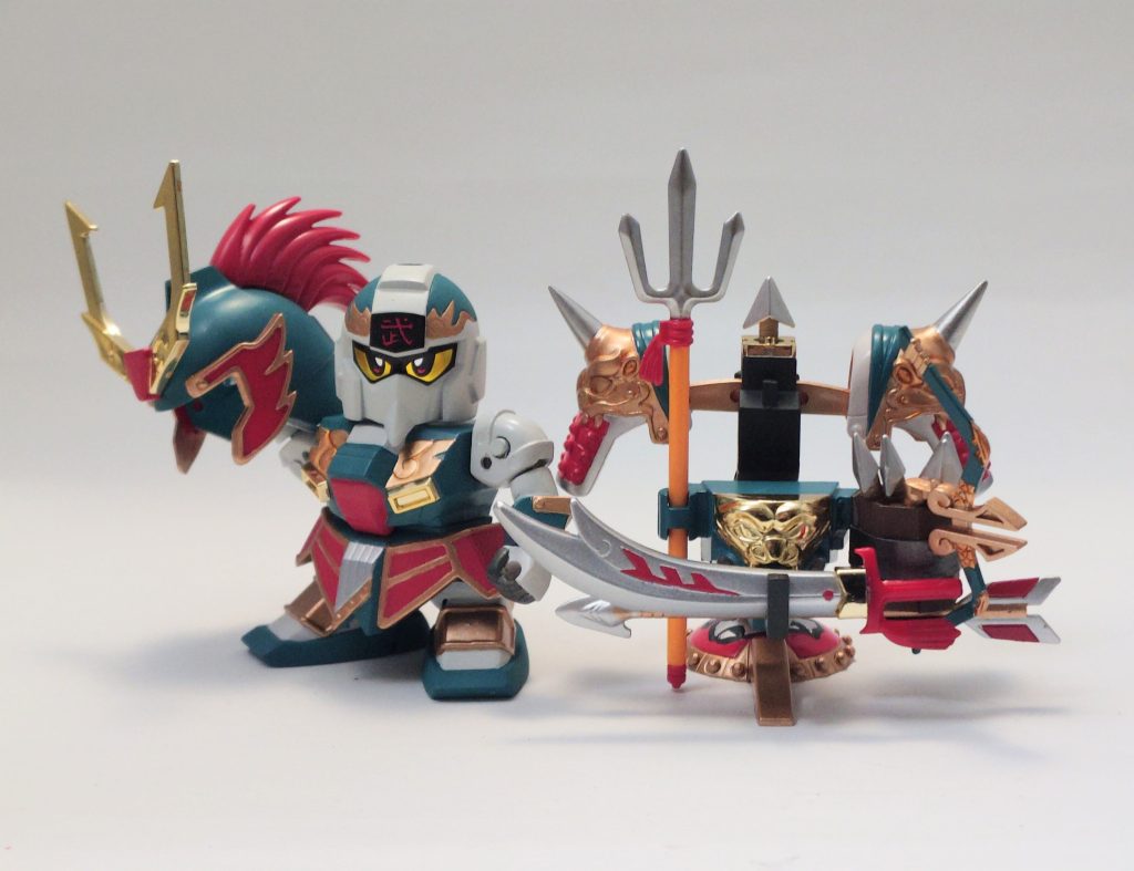 武神頑駄無が身に付けている「阿修羅の神器」をまとめた状態。台座っぽくまとまっていい感じですね。カラーリングは全て水性ホビーカラーで、白…グランプリホワイト青…ルブリスウルグリーン赤…サーモンピンク金、銀はそのまま使用しています。金はそのままだと赤味が強いので普段は銀を混ぜたりするんですが、今回はイメージが合うのでそのまま。まあ何よりルブリスウルグリーンの発見が大きかったです。工作が終わった後、この青緑どうするかな…と思ってしばらく放置していたんですが、たまたま塗料売場で目についたこれにビビビときて使ってみたらピッタリでした。クレオスさん、この色、これからは武神頑駄無ブルーとしても売り出せますよ!