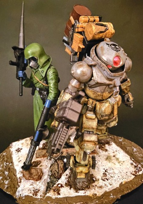 「戦友」グリモァ!と最前線に立ち、敵地へ乗り込む兵士をイメージしています!!グリモァ!頭部のマークと、