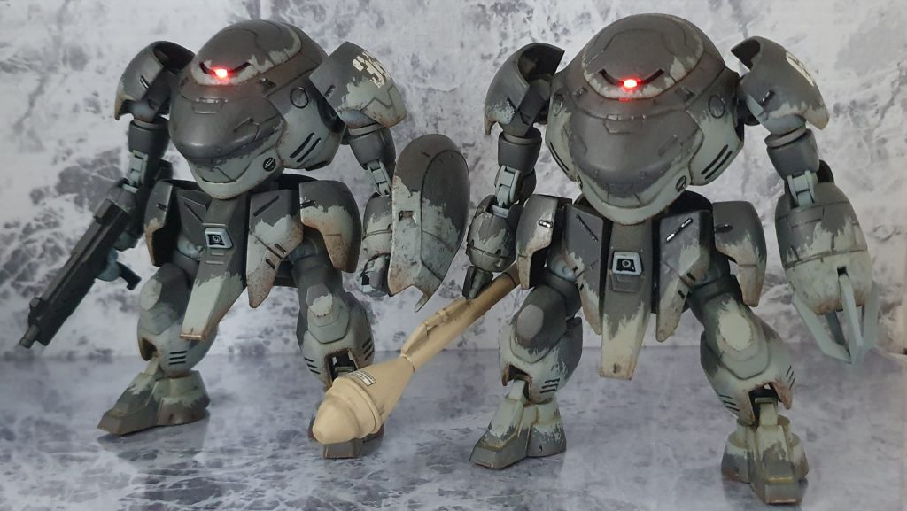 右が65番機、左が36番機【主な改造点】〜全身〜 鋳造表現を施してあります。〜頭部〜 ほぼキットのまま！アンテナ基部を埋めた！〜腕部〜肩はレギンレイズを加工した物に腰部サイドスカートを装着！【36番機】スピナ・ロディの前腕(HG アスタロト付属)をモンキーロディに合わせて調整し、両腕に採用。【65番機】左腕はモンキークラブ・ロディ用の物をツメをカットし主張を抑えめにしてある。〜脚部〜 鉄血オプションセット9付属の地上用グレイズ用の物を加工して使用。短足になったので、よりゴブリン感が増している？〜武器〜【65番機】MGドム付属のシュツルムファウストを改造して、オーバーサイズのパンツァーファウストにした！&nbsp;