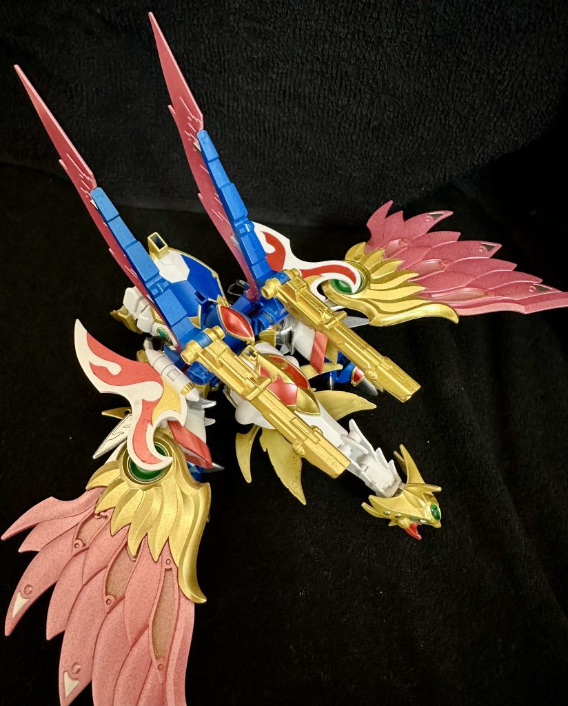 頭部が重くて下から支えています。