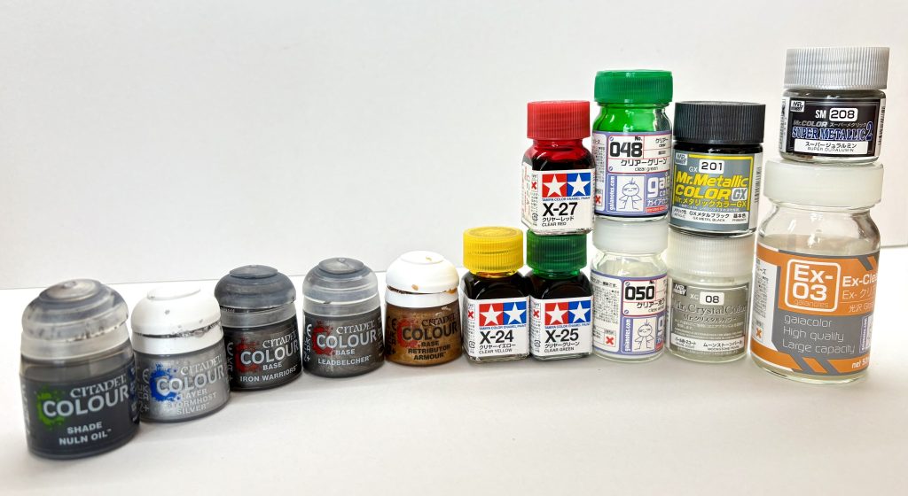 (塗装メモ)・下地(全体)：シタデルカラースプレー黒・キャンディ塗装(エアブラシ)&nbsp;下地黒→シルバー(スーパージュラルミン)&nbsp;外装:クリアグリーン(ガイアノーツ)&nbsp;対艦ミサイル、肩の取っ手部:クリアホワイト(ガイアノーツ)にムーンストーンパールを少量混ぜて塗装・キャンディ塗装(筆塗部)&nbsp;下地:シルバー(シタデルカラー)　黄色:クリアイエロー(エナメル塗料)&nbsp;赤部:クリアレッド(エナメル塗料)&nbsp;緑部:クリアグリーン(エナメル塗料)・フレーム部　シタデルカラー&nbsp;IRON WARRIORS,LEADBELCHER,RETRIBUTOR ARMOUR,STORMHOST SLIVER・ビームライフル&nbsp;GXメタルブラック(エアブラシ)・墨入れシタデルカラー NULN OIL