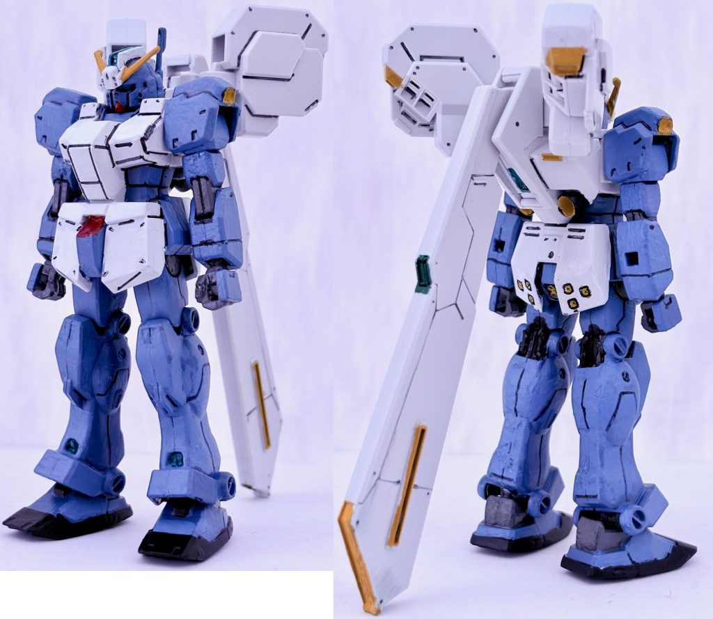 フロントビューとリアビュー。全体的にミディアムブルーを塗りまくり、ガンダムの目、足とジムライフルのセンサーはメタリックグリーン、トライブースターとアーマーは艶消しホワイトで塗った。関節部はつや消しブラックとグレーを混ぜ、アンテナ等の細かい部分はイエローで塗った。ちなみに素組みだと合わせ目がかなり目立つので、その都度ヤスリ掛けした。また墨入れペンでディティールアップを行った。