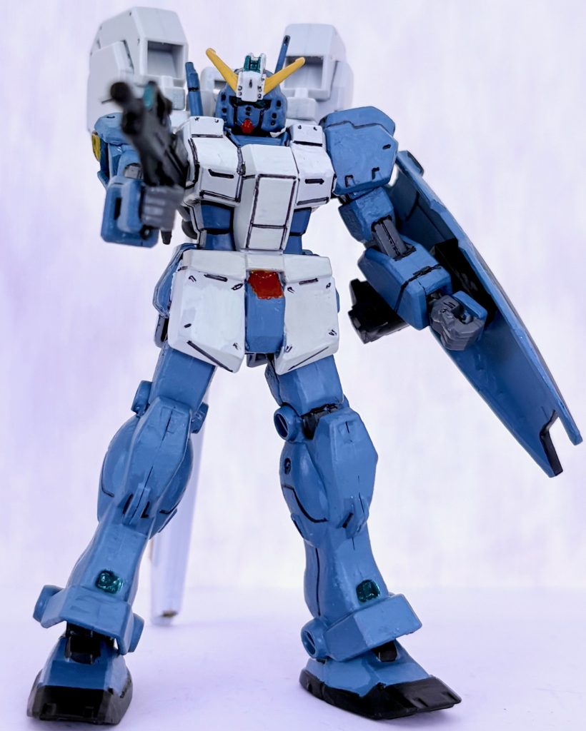 まずは軽く機体の説明から。ティターンズが「ＴＲ計画」にて開発したヘイズルの予備機をベースに改修された機体で、ガンダム頭以外はジム・クゥエルのままだったが頭頂部を多面形センサーに換装、肩部に補助アクチュエーター・ユニットを増設し、試作型バックパックであるトライ・ブースター・ユニットが装着された。背中のトライ・ブースターはバックパック左右に配置された２基の「可動式ユニバーサル・スラスター・ポッド」と、「シュツルム・ブースター」で構成される高機動装備で、自在に推力方向を変化させ、さらにポッドの質量移動によるＡＭＢＡＣシステムとしても機能する。ただし、上記の装備は1号機用のモノだったため急遽作られた2号機との相性は決して良好とは言えず、操縦難度の高い機体となってしまった。なお本キットの胴体にアーマーが装備されている。