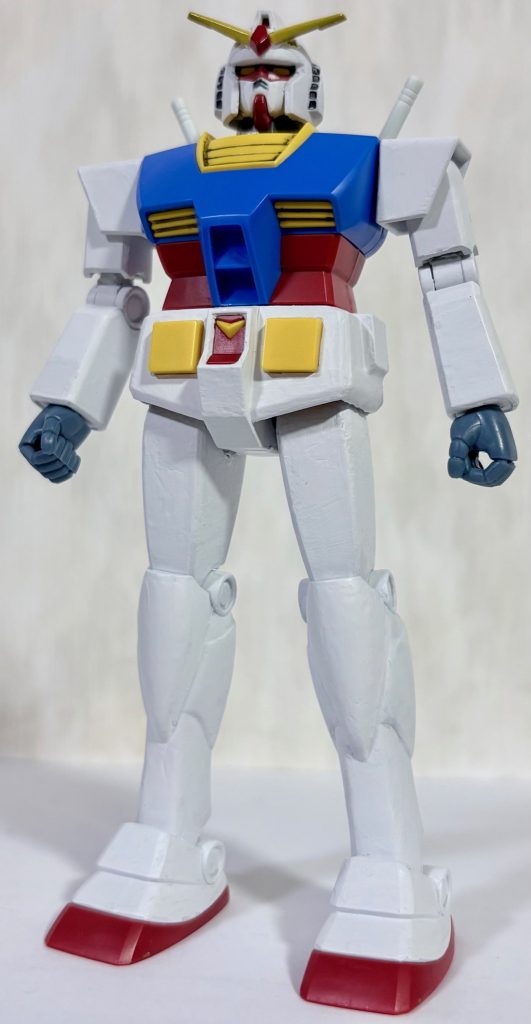 下半身のスカート部分をはめて、合わせ目が出ないよう接着&パテ盛りする事で合わせ目が目立たなくなる。なお軸は太ももの付け根がスカートに干渉しないよう気持ち下に配置する。これによって太ももがほとんど干渉を受けずに済む。