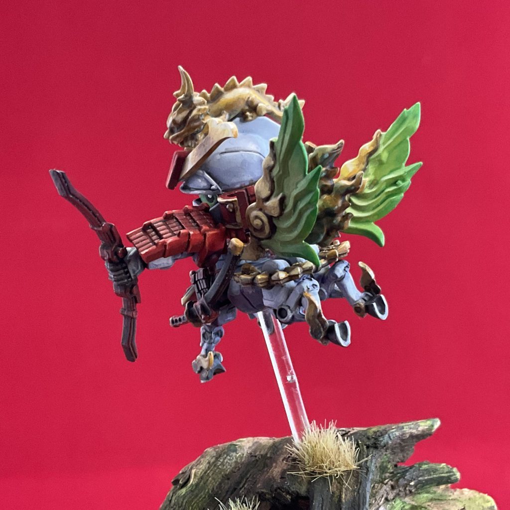 I tried to paint the wings as if they were glowing and the gold with non metallic metal, but I still have a lot to learn.&nbsp;