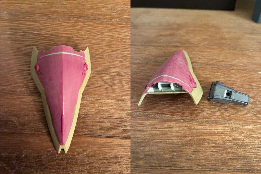 シールドの工作。前述の通りバインダーと干渉しないよう上端を切り離したのち、切断箇所から少し下に切り込みを入れてプラ板を差し込み接着することで断面をふさぎ、メカ的なディテールを配置。左腕のグレネードユニットに、シールドを取り付けるためのポリキャップを設置。