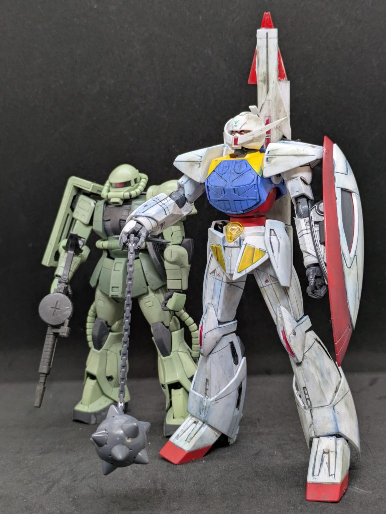 ボルジャーノンのイメージで量産型ザクと並べました。カプル欲しい。ターンエーの作品の魅力としては「黒歴史」という一般でも使われるようになった用語を生み出したことと、全てのガンダムはターンエーに通じるということで、どちらかというと宇宙世紀派に認められていなかった「アナザー系」も「同じガンダムなんだよ」とまとめてくれたことではないでしょうか？少なくとも宇宙世紀派の方も、御大が言ってるんだからそうなんだよね、と寛容になったのではないでしょうか。（放送当時はまだSEEDは放送してなかったかな？）ガンダムの中では異質の作品かと思いますが、未視聴の方はぜひ観てください。