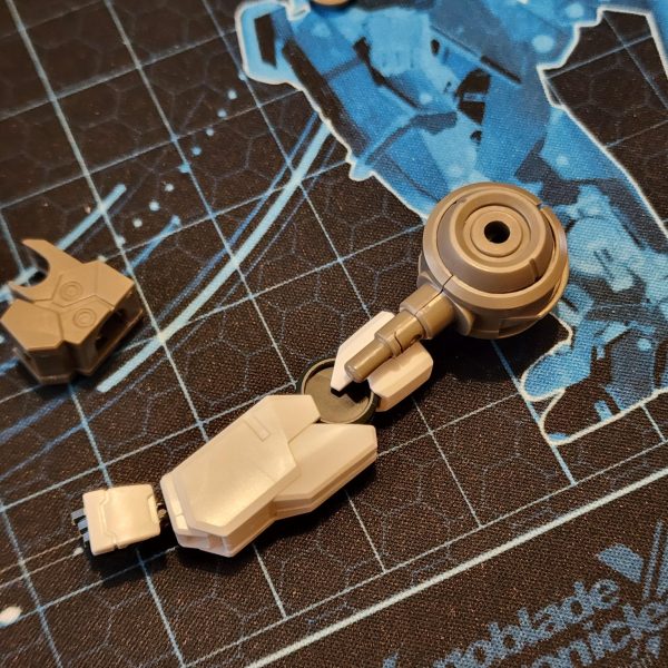 初めてのミキシングなので、両方のキットをまず完全に組み立ててからパーツをいじるのが一番だと思っています。固まらないパテ(こちらではブルータックという名前です)で接着しています。
今のところ、かなりかっこよく仕上がっていて、イメージにかなり近いと思います。皆さんはどう思いますか?
今後目指す変更点:
GN-Xの丸い腕を、四角いケルディムの腕に交換する。
足のサイズを大きくする。
頭部の触角を変えるかも。
四角いプレートを胸部に貼り付けました。腰部との連続性が生まれて嬉しいです。うまくいきました!
これがどれほど大変な作業になるかはすぐに分かりましたが、ワクワクしていて、狂ったようにハッキングを始めるのが待ちきれません。
新しい道具はいつ配達員が届けてくれるのでしょうか?もうすぐですね。As this is my first time mixing, I feel like the best direction is to build both kits fully and then play around with parts. I stick them together with a putty that doesn't set. (It's called Blu-Tak here.)I think it looks pretty cool so far and quite close to what I imagined. What do you guys think?Some more changes to aim for:Replace the rounded GN-X arms for the square Cherudim arms.Increase the size of the feet.Maybe alter the antennae on the head.I stuck the square plates to the chest. I'm very happy that they provide continuity with the waist. It works! I've quickly come to realise how much effort this is going to be but I'm very excited and can't wait to start hacking away like a mad man.When will the courier bring my new tools? Not soon enough. (3枚目)