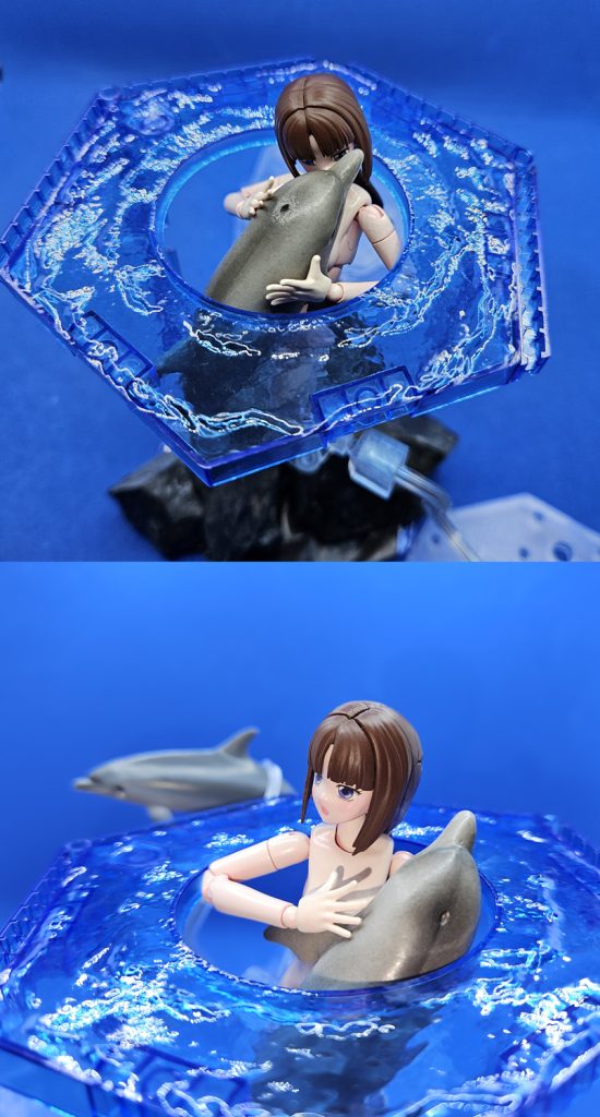 イルカとスキンシップするティファその時、イルカたちが示す方向にニュータイプの白いイルカが現れる