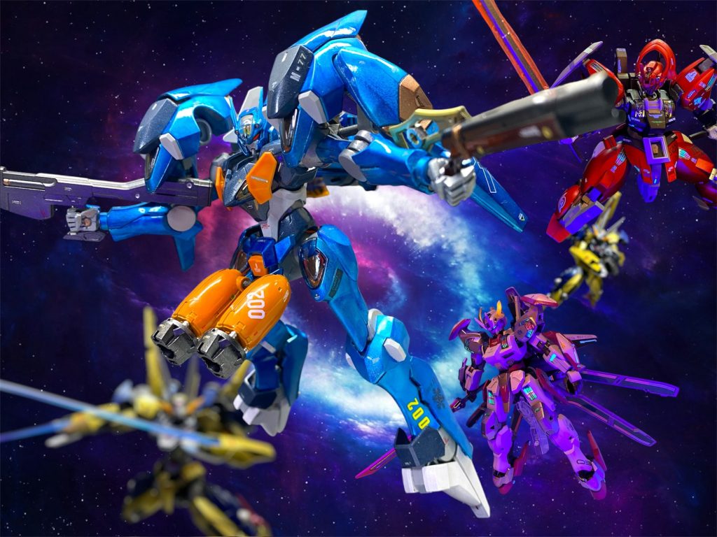 「君ハ、ソレデイイノカ?」 ひとしきり、サビーナの独白を聞き終えたスレッタの横で、漆黒の騎士はポツリと呟く。 「モシ君ノ友人ガ他人ノ分マデ罪ヲ背負イ込ム様ナ奴ナラバ、永遠二ツヅク苦悩ノ中ノ彼ヲ見テ、君ハ、ソレデイイノカ?」 「良い訳無いだろ…私が望むのは、幼い頃からアーシアンとスペーシアンの対立の間に立たされて、ずっと心を痛め続けてきシャディクの、ただ安らかなる魂の救済だ。」 「サビーナ先輩!、ここを開けてください!私たち、止めに行きます!」 「緊急警報!緊急警報!収監していた容疑者たちが何者かの手引きにより脱走し、MSで蜂起した模様。繰り返す、緊急警報!緊急警報…」 隔壁を破壊してまわった、その爆発音と振動は、議長とミオリネの居る貴賓室にまで確かに伝わった。 「な、何?この爆発は?」「ミオリネ、今のうちにボクたちも逃げ出すんだ!MSデッキへ急いで!」 ロックの外された牢獄から脱獄した面々は、逃走の為に続々とMSデッキへ辿り着いた。そこには、闘技場から接収された機体たちがそのまま格納されており、その中からミオリネたちもローゼッテを見つけ出し乗り込んだ。 「せっかく舞踏会に来たんだ、手ぶらで帰るのも何だしね。ラストダンスは、ド派手に踊らないとね!」先に乗り込んでいたエラン・ケレスのファラクト・ウンディーネが、何処からか掻っ攫って来たクラシックな銃を派手に撃ち放している。どうやら、この宇宙議会連合の戦艦から手土産に頂いてきたらしい。 「持ってけよ、ほら。コレは元々お前のだろ?」ダリルバルデ・ザラマンデルに乗り込んだグエル・ジェタークは、そう言って、背中に装備していたガーディアンのうちの一振りをローゼッテに差し出した。 「あーしのデミバは壊れちまったから、このGUND-ARMちょっと借りてくぜ!」そう言ってチュチュは、議会連合に保管されていたルブリス・シルフィードで飛び出していく。かつて愛機のデミトレーナーが装備していた物と同じ型のライフルが目にとまったらしい。