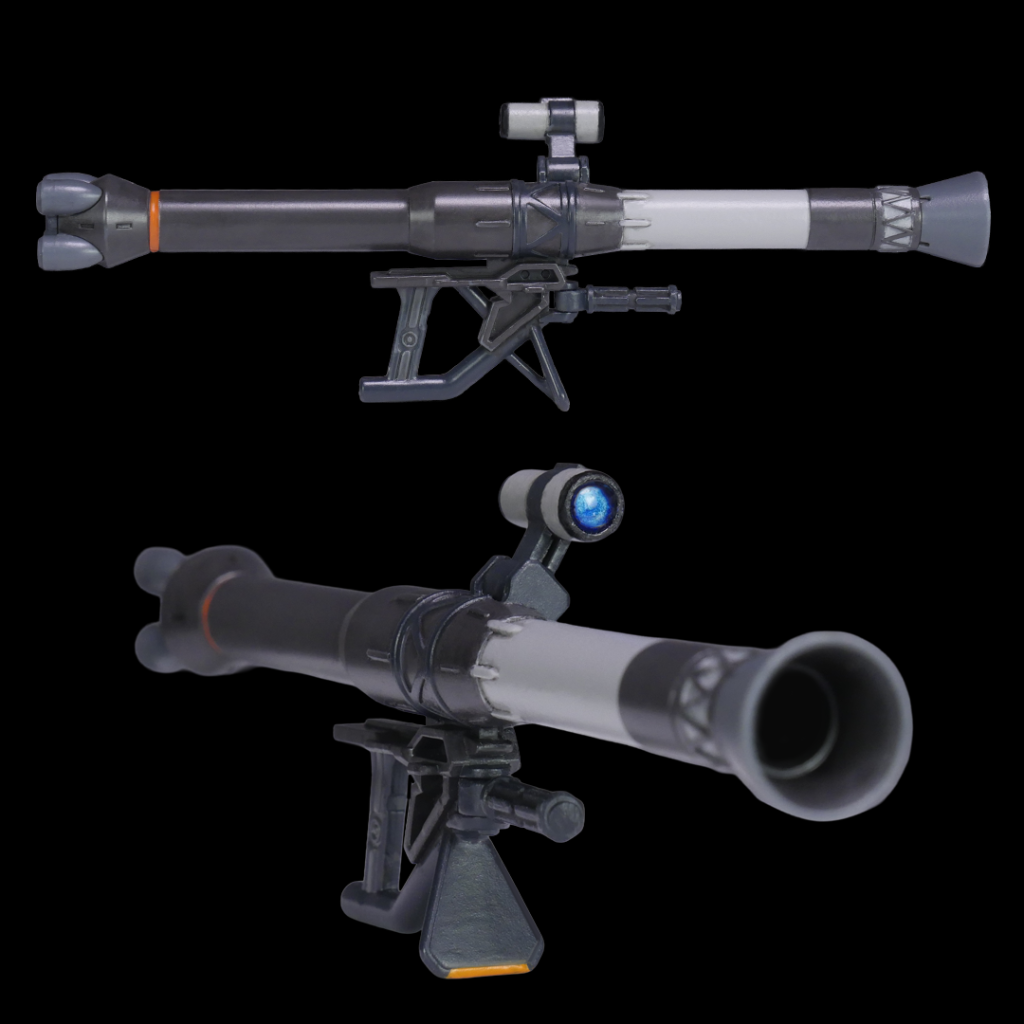 そして、おそらく本体以上にこだわり、作業時間をかけたのがバズーカです。Amazonのサンプル画像を真似て、タミヤのアクリルで赤色系のグレー、青色系のグレーを調色しました。白帯部分はスカイグレイです。レンズはタミヤのエナメルのクロムシルバーの上からアクリルでクリアブルーを塗ってます。