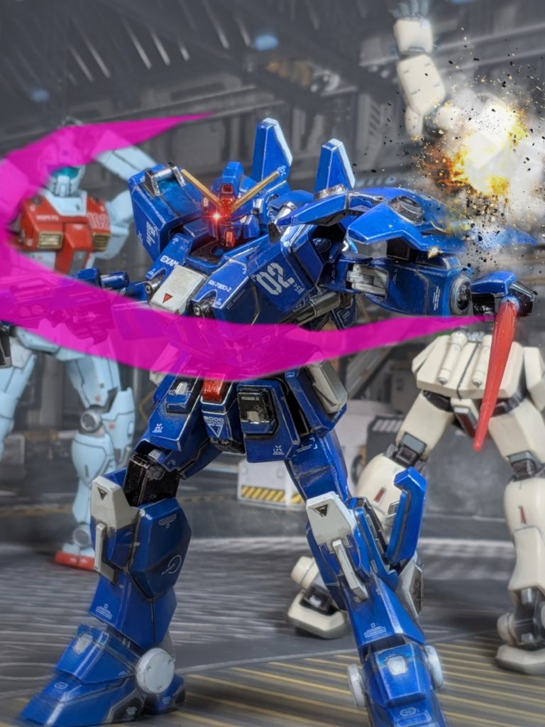 「EXAMの恐ろしさ…、その目に焼きつけるがいい‼️」ヅガーン‼️ビームサーベルの一閃で、あっさりジム・コマンドを斬り捨てる