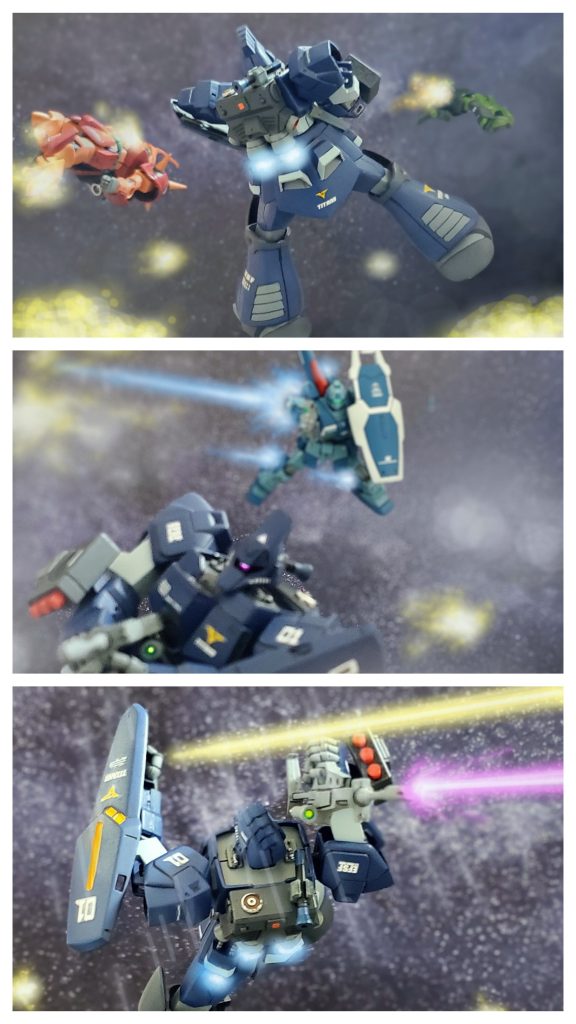 連射される高出力ランチャーの猛攻が止み、気付くとフィリップはメイベルの撃破したMSの残骸が漂う中にいた…。どうやらメイベルは、ランチャーを囮に自分の戦いやすい場所にフィリップを誘導していたようだ…。『ほぉう…やってくれるじゃねぇか…。』宙に浮かぶ残骸と損傷炎により視界の良くない状態の中に姿を眩ましたメイベルのネモ。フィリップは感覚を研ぎ澄ませ次のメイベルの動きを予測する。次の瞬間❗動きを止めたフィリップの背後にビームライフルを構えたメイベルのネモが姿を現す‼️障害物が多く感知センサーが役に立たない状況で、フィリップは後ろに回ったネモを感覚的に察知する。『いただき‼️』背後を取ったメイベルはビームライフルを絶好のタイミングで放つが、その攻撃を一瞬早く察知したフィリップは機体を反らし間一髪回避。そして回避と同時に背後に向けビームライフルを撃ち返す‼️