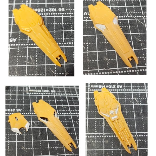 【ガンダムアーティファクト　Hi-νガンダム　ライフル　シールド改修】①ビームライフルのセンサー部分と後方部のディテール追加。②シールドのダクト部分のディテール変更。切り抜いて、プラ板でモールドを掘ったものをはめ込む。裏も接続部分をネオジムを仕込む。③シールドアタッチメントの制作。直径2㎜厚さ1㎜のネオジムをＬ字型にプラ板、プラ棒で制作したアタッチメントの2面に仕込む。④アタッチメントの2面を使い、肘を曲げても横の面に装着できます。⑤腕にもネオジムを仕込んでいるので、シールド装備しないときのネオジム隠しを制作。フタにネオジム仕込んでます。大きな変更はしていませんが情報量をちょい足し改修でした。アタッチメントは、前回の改修ではホチキスの針で磁石受けをしていましたが取れやすかったのでネオジムをふんだんに使いました。（3枚目）