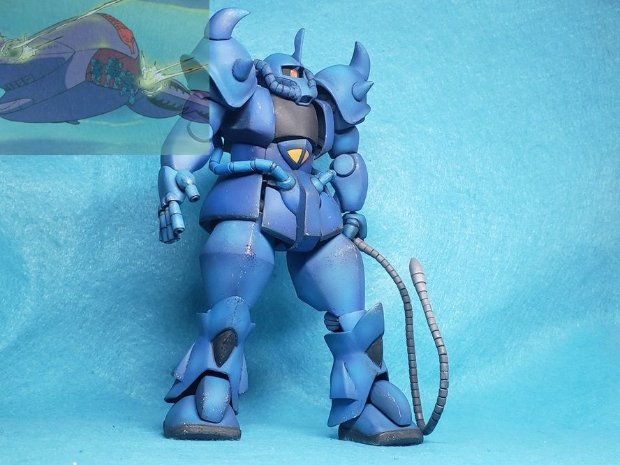 ジャブロー侵攻のシーン。ガウ攻撃空母から降下する左手にヒートロッド、右手にバルカン装備タイプ。